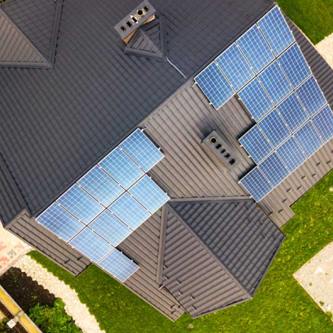 aerial-view-rural-private-house-with-solar-photovoltaic-panels 1